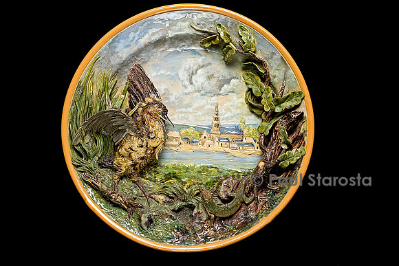 Plat au blongios, (variété rare de héron), face à un lézard
