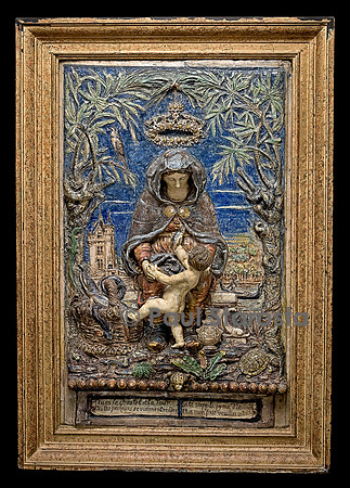 Plaque dans un cadre en bois doré représentant la Vierge et l’Enfant