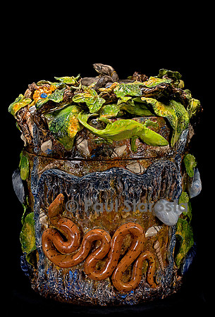 Serpent dans son nid de feuillage et de fleurs - Christine Viennet